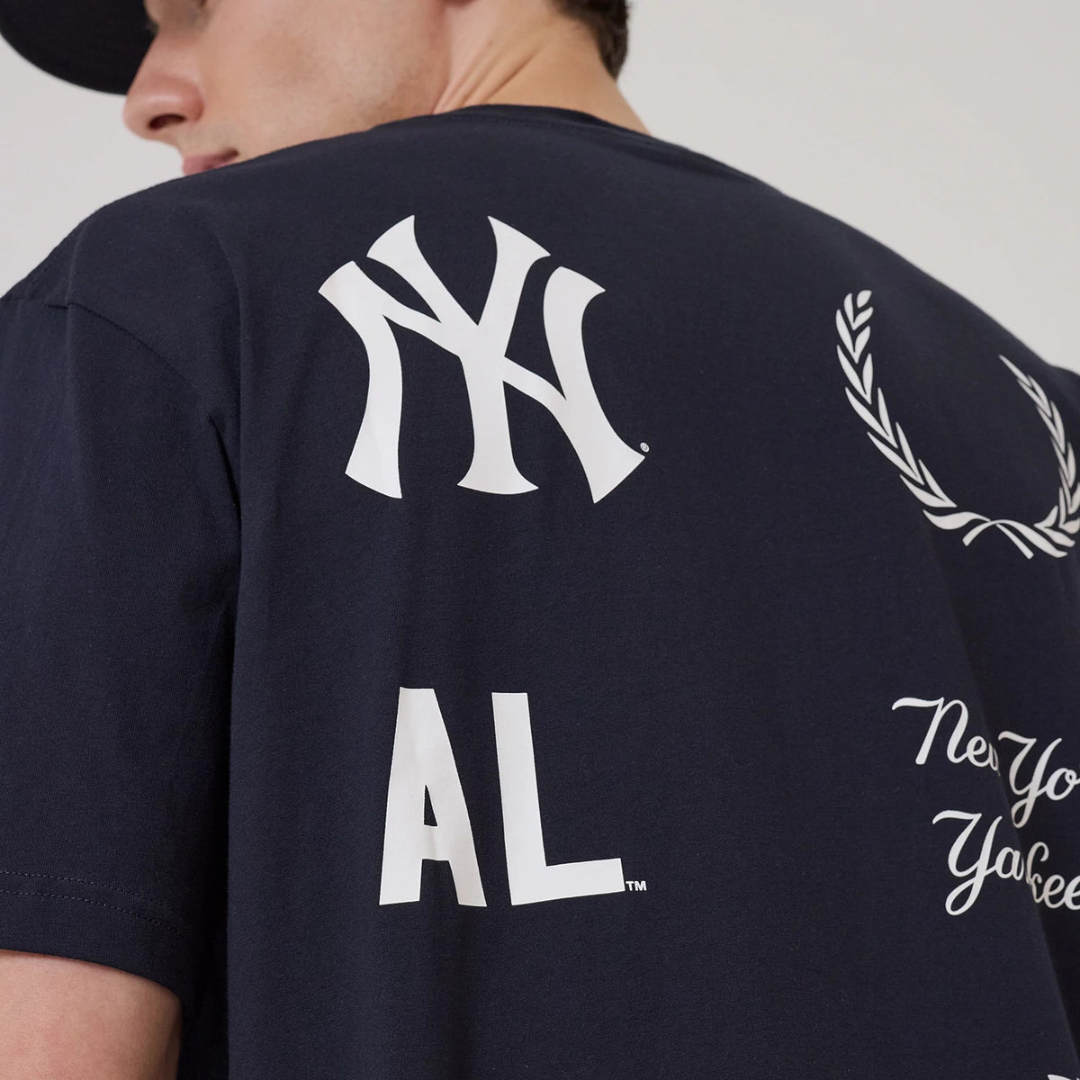 The model is wearing this MLB Match New York Yankees T-Shirt in navy. 4