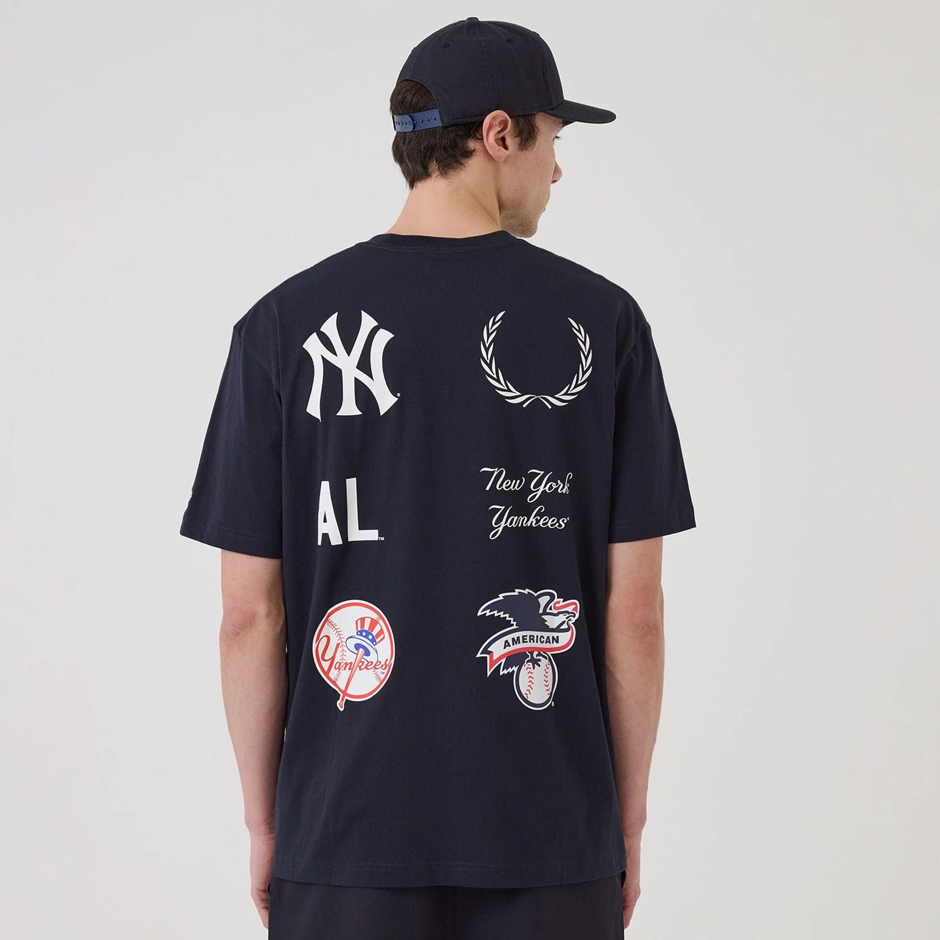 The model is wearing this MLB Match New York Yankees T-Shirt in navy. 2