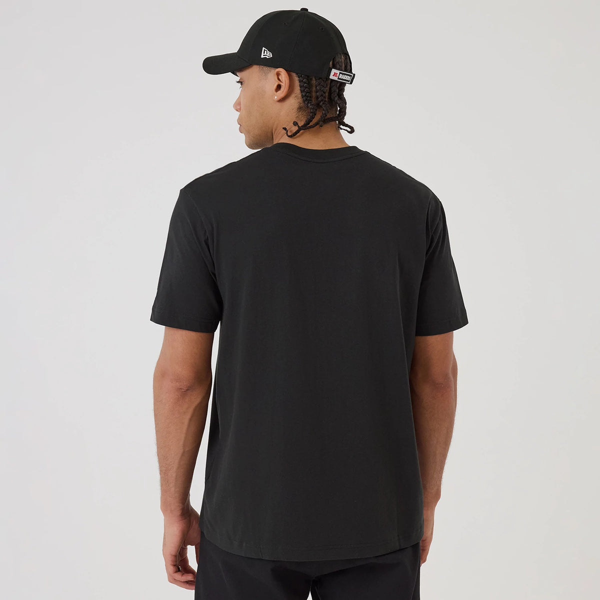 The model is wearing this NFL Sport Classic Las Vegas Raiders T-Shirt in black. 2