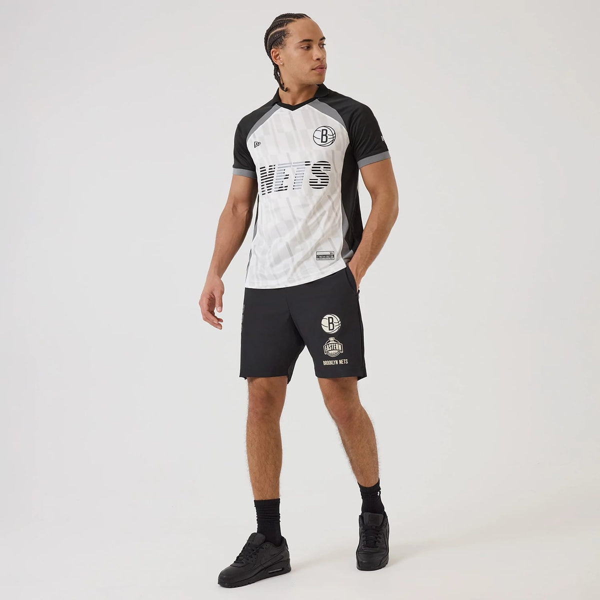 The model is wearing this NBA Match Brooklyn Nets T-Shirt in black. 8