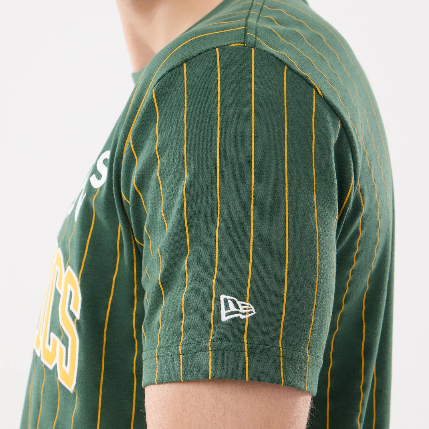The model is wearing this MLB Pinstripe Athletics T-Shirt in dark green. 3