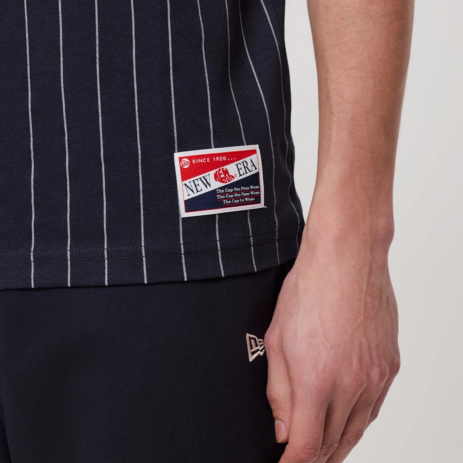 The model is wearing this MLB Pinstripe New York Yankees T-Shirt in navy. 4