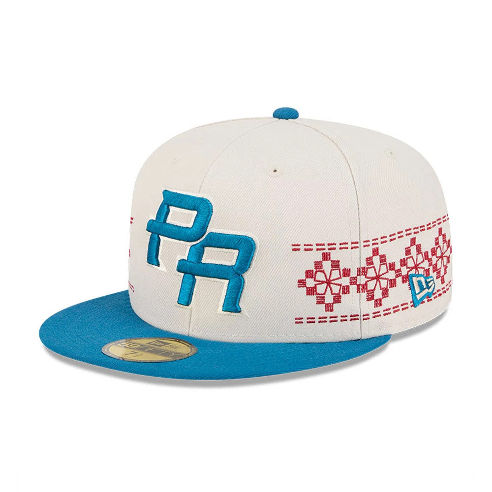 Puerto Rico WBC Latin Embroidery Light Beige New Era 59FIFTY Fitted Cap, front three-quarter view showing raised blue PR embroidery on the front panel, detailed red embroidery around the sides, blue visor, and a gold 59FIFTY size sticker.