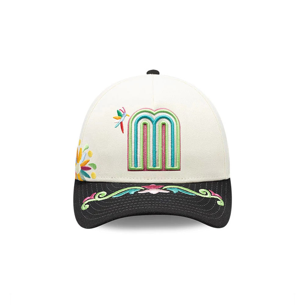 Mexico WBC Latin Embroidery White New Era 9FORTY M-Crown A-Frame Adjustable Cap, front view showing colourful embroidered M logo with intricate floral patterns on the visor and crown, featuring a parrot motif to the side.