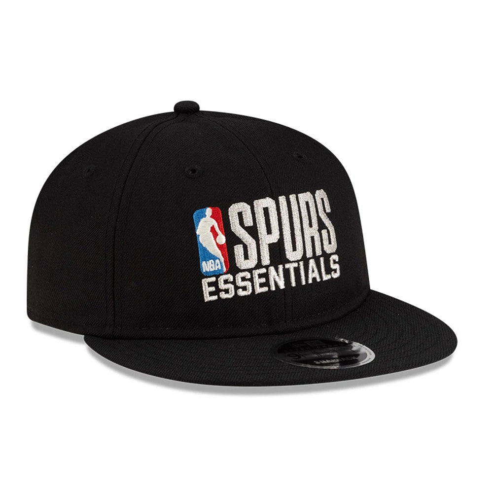 San Antonio Spurs FOG x NBA Black Retro Crown New Era 9FIFTY Adjustable Cap, front view showing the raised embroidered Spurs Essentials logo in white and NBA logo in red and blue, with a flat black visor and 9FIFTY size sticker.