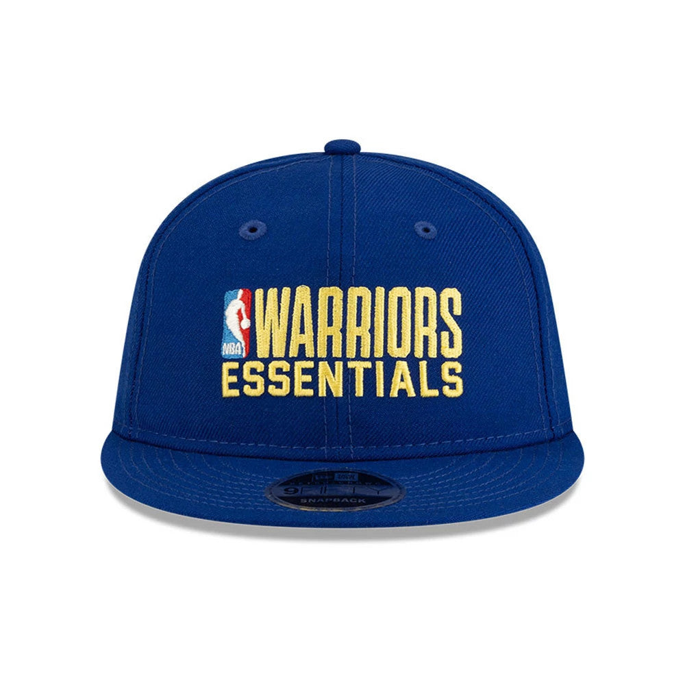 Golden State Warriors FOG x NBA Blue Retro Crown New Era 9FIFTY Adjustable Cap, front view showing raised yellow Warriors Essentials embroidery and the NBA logo on a structured blue crown with a flat visor and a black 9FIFTY size sticker.