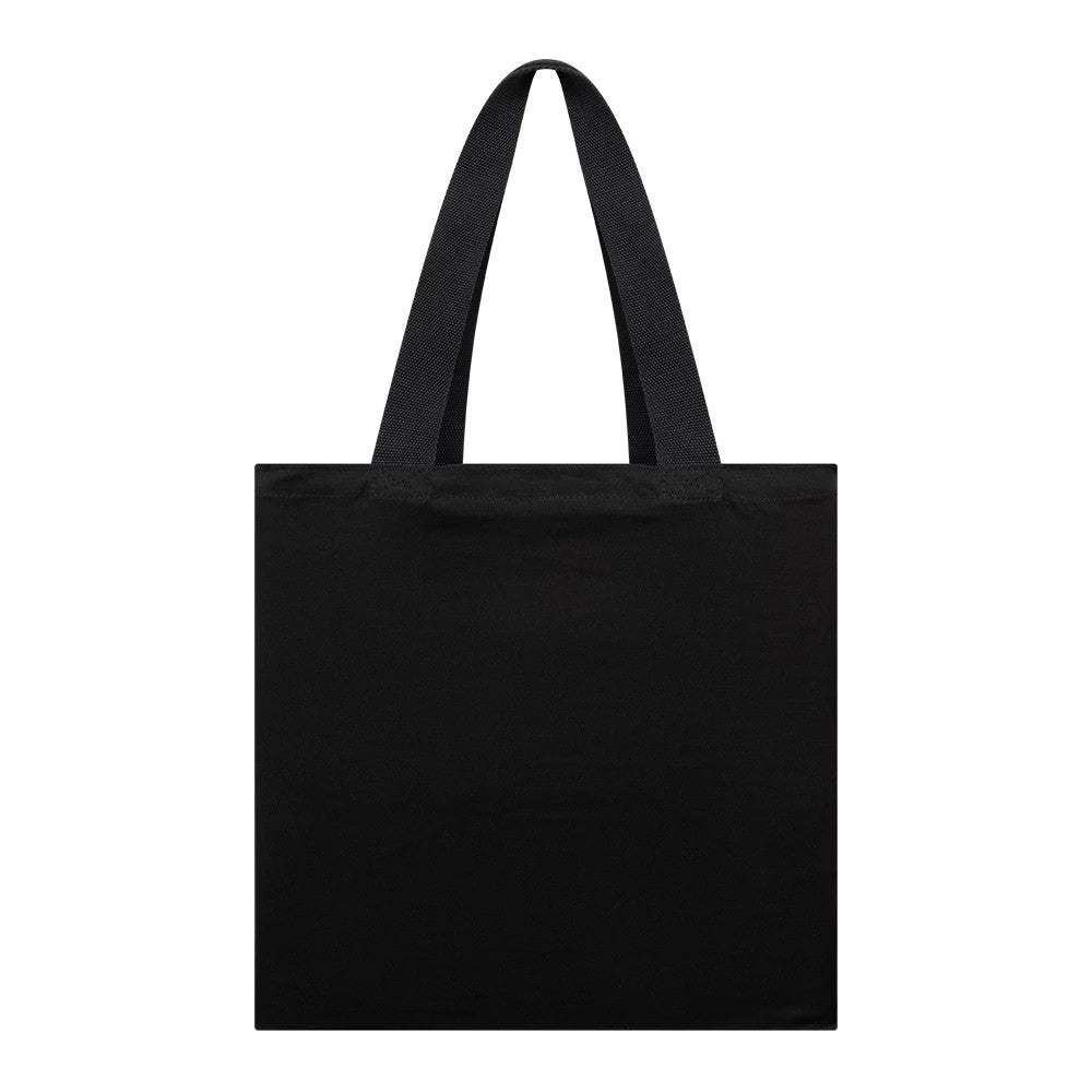 New Era Shield Logo NFL Madrid Game 2025 Black Tote Bag, front view showcasing a black surface, two handles rising from the top edge, and a debossed New Era logo near the bottom left corner.