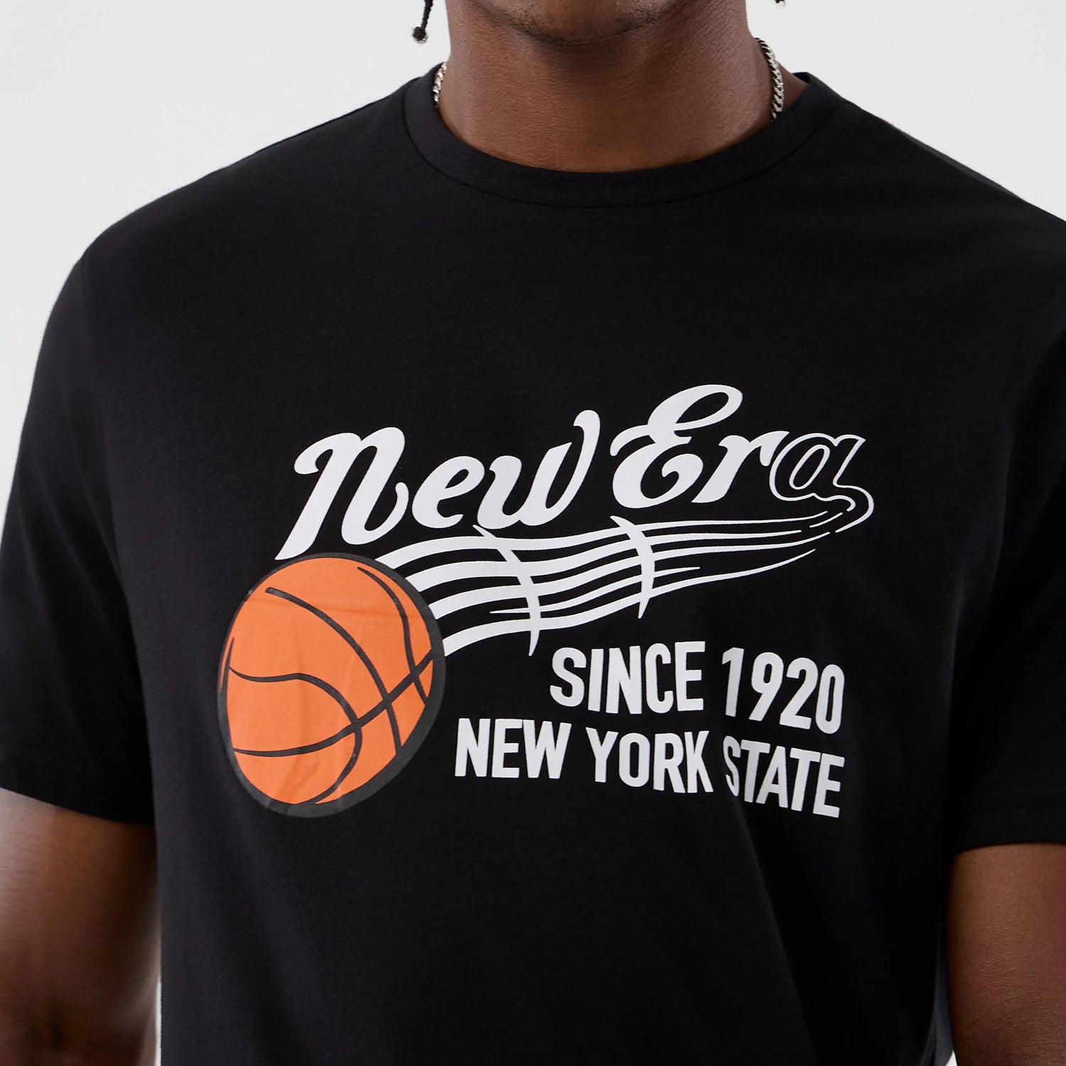 The Male model is wearing New Era Back To School Black T-Shirt 4