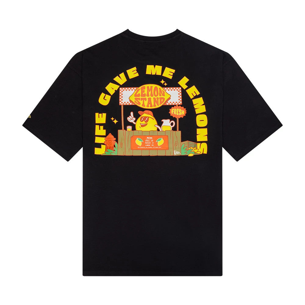 New Era Summer Graphic Black Oversized T-Shirt, back view showing a lemonade stand graphic with Lemon Stand text and Life Gave Me Lemons in bright yellow lettering curving around the edge of the design.