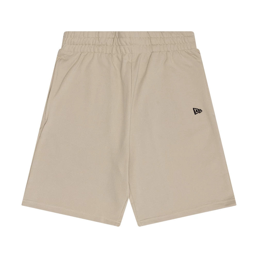 The Male model is wearing New Era Flag Light Beige Shorts 1