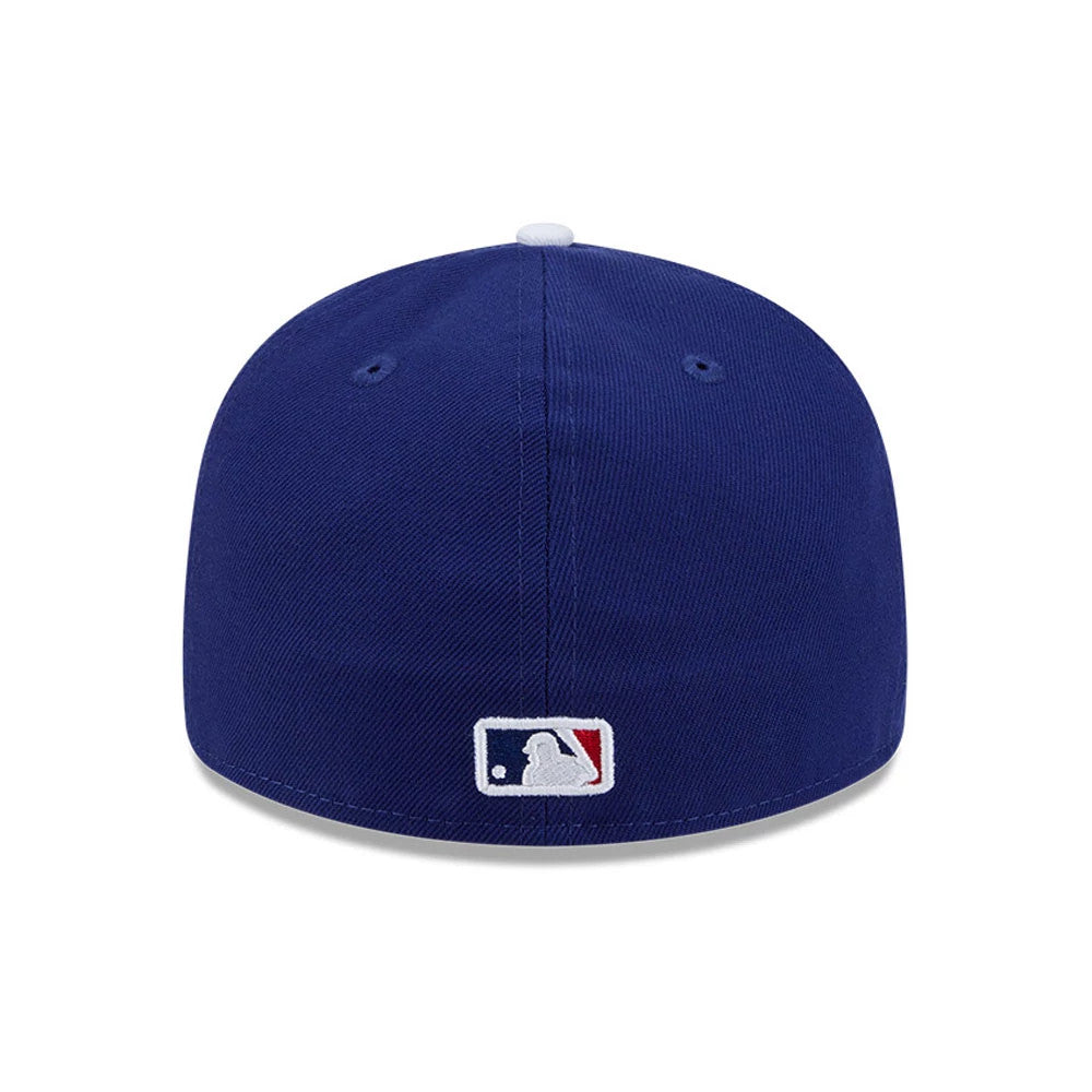 LA Dodgers MLB Spring Training 2026 Blue Low Profile New Era 59FIFTY Fitted Cap, rear view showing the embroidered MLB Batterman logo centred on the structured blue crown with matching blue eyelets and a white top button.