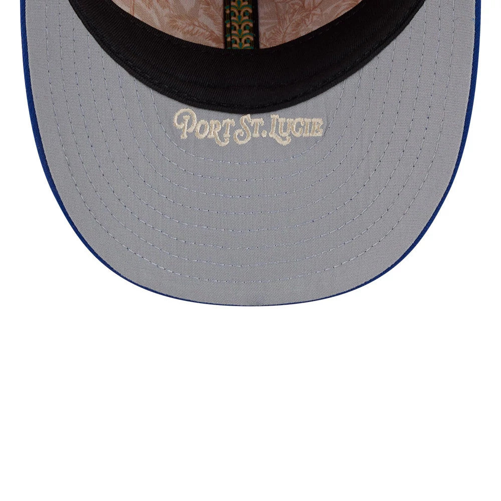 New York Mets MLB Spring Training 2026 Red Low Profile New Era 59FIFTY Fitted Cap, inside view showing a grey undervisor with Port St. Lucie embroidered in white, a black sweatband, and palm-themed taping with MLB logos.