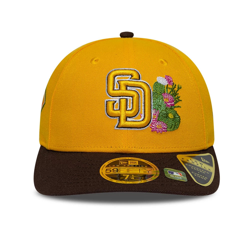 Padres MLB Spring Training 2026 Yellow Low Profile New Era 59FIFTY Fitted Cap, front view showing the raised SD logo in gold and white embroidery with floral details, featuring a brown flat visor and a gold 59FIFTY size sticker.