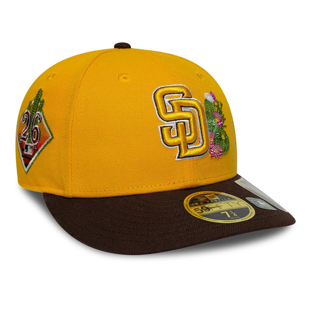 Padres MLB Spring Training 2026 Yellow Low Profile New Era 59FIFTY Fitted Cap, three-quarter view showing the raised yellow embroidered SD logo with a cactus graphic on the front panel, brown visor, and gold 59FIFTY size sticker on the visor.