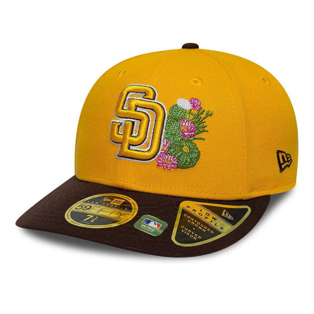 Padres MLB Spring Training 2026 Yellow Low Profile New Era 59FIFTY Fitted Cap, three-quarter view showing a yellow and brown SD logo with floral embroidery on the front, brown visor with gold 59FIFTY size sticker.