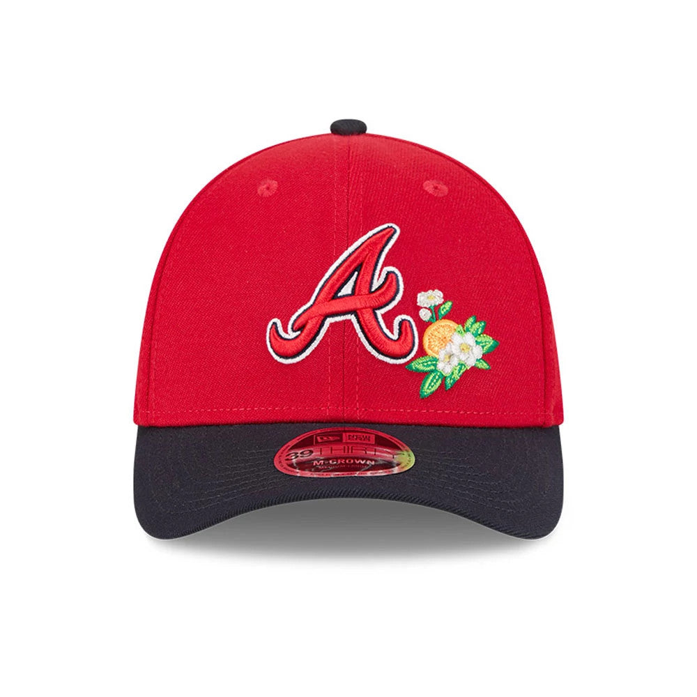 Atlanta Braves MLB Spring Training 2026 Red New Era 39THIRTY M-Crown Stretch Fit Cap, front view showing the raised red embroidered A logo with floral accents on the structured red crown, and a black curved visor with a 39THIRTY size sticker.