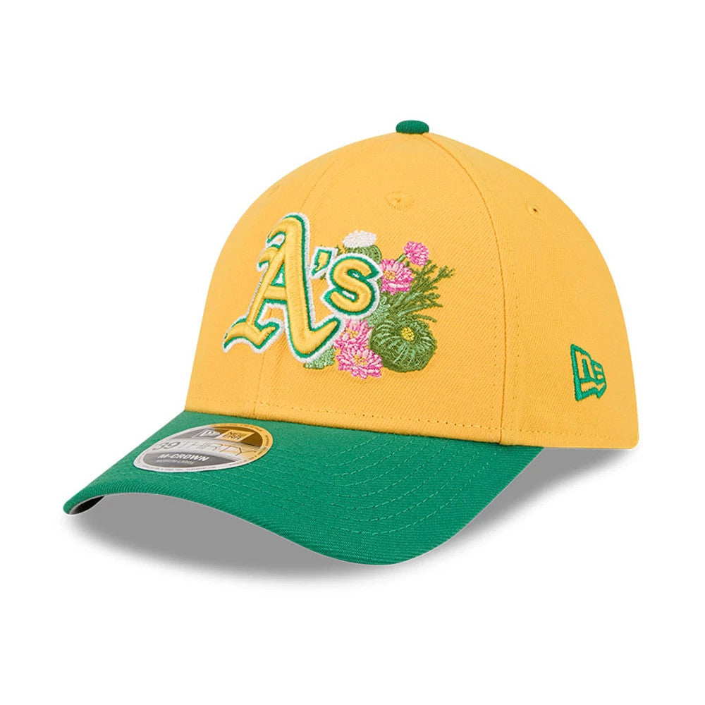 Athletics MLB Spring Training 2026 Yellow New Era 39THIRTY M-Crown Stretch Fit Cap, three-quarter view showing a raised green and white embroidered A's logo with floral elements on the front panel.