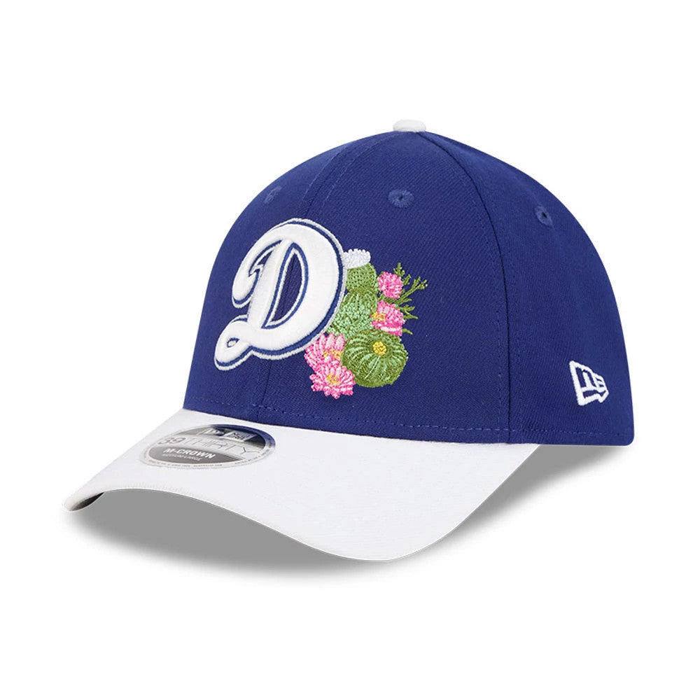 LA Dodgers MLB Spring Training 2026 Blue New Era 39THIRTY M-Crown Stretch Fit Cap, three-quarter view showing the white embroidered LA logo with colourful cacti on the front panel, a white curved visor and a 39THIRTY size sticker.
