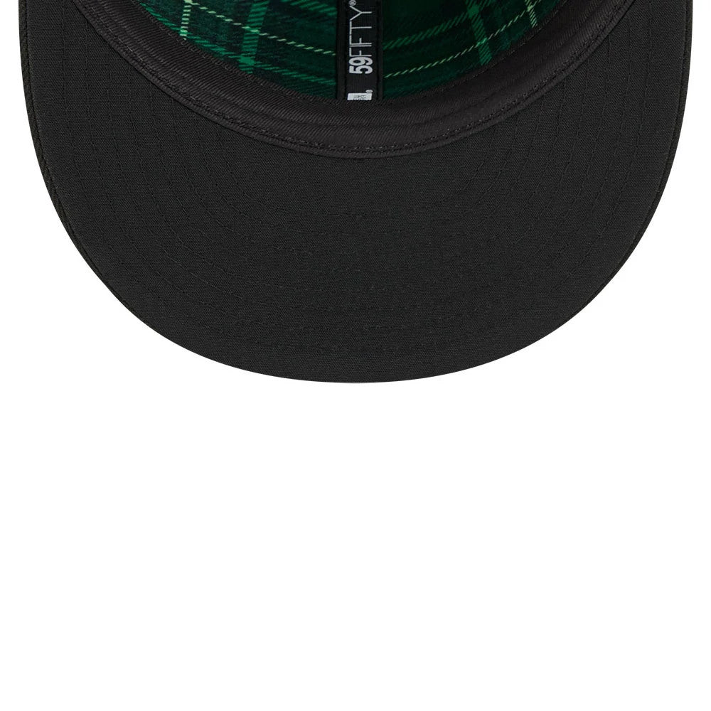 New York Mets MLB Saint Patrick's Day Black New Era 59FIFTY Fitted Cap, inside view showing green plaid taping and a black sweatband on the interior, with the New Era 59FIFTY label at the centre.
