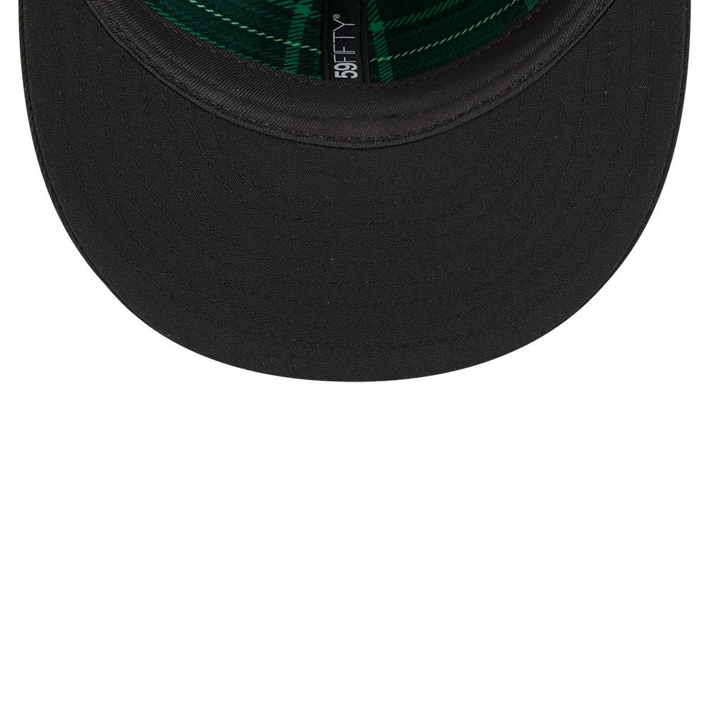 Athletics MLB Saint Patrick's Day Black New Era 59FIFTY Fitted Cap, inside view showing the green checked taping, the black sweatband and black undervisor, with 59FIFTY branding on the inside of the crown.