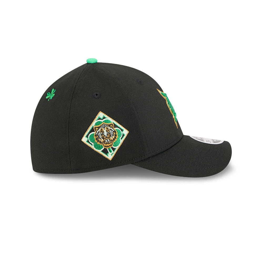 Tigers MLB Saint Patrick's Day Black New Era 39THIRTY M-Crown A-Frame Stretch Fit Cap, side view showing a green four-leaf clover embroidered on the panel, with a detailed tiger emblem on the side.