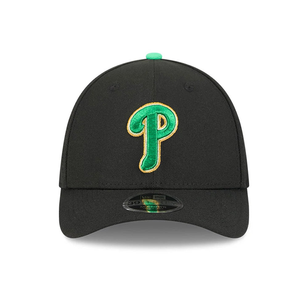 Pictured is this MLB Saint Patrick's Day Philadelphia Phillies 39THIRTY M-Crown A-Frame Stretch Fit cap in black. 2
