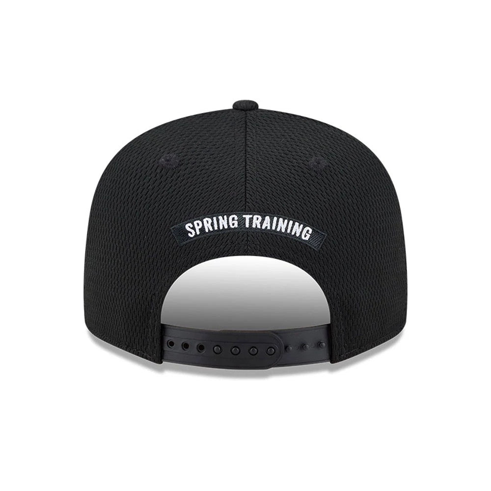 Chicago White Sox MLB Grow Black New Era 9FIFTY Snapback Adjustable Cap, rear view showing the white embroidered Spring Training lettering above the adjustable black snapback, set on a textured black crown.