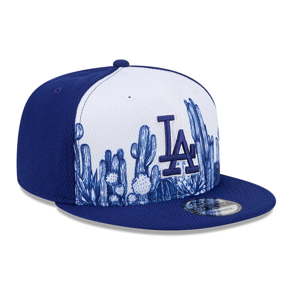 LA Dodgers MLB Grow Dark Blue New Era 9FIFTY Snapback Adjustable Cap, three-quarter view showing a navy LA logo embroidered on the front white panel with blue cactus graphics, navy flat visor and a 9FIFTY size sticker.