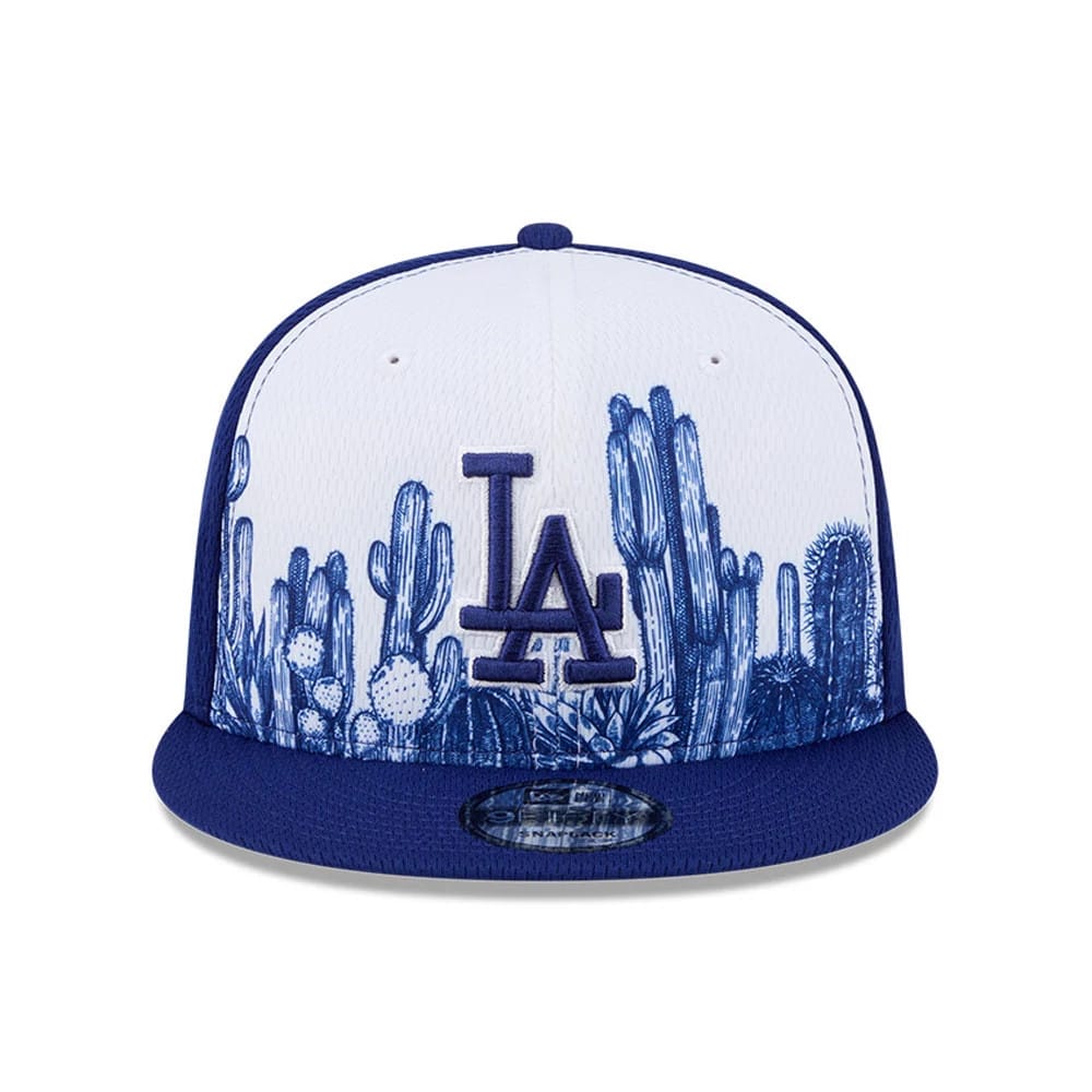 LA Dodgers MLB Grow Dark Blue New Era 9FIFTY Snapback Adjustable Cap, front view showing a raised dark blue LA logo embroidered over a white crown with a detailed blue cactus graphic and dark blue flat visor with a 9FIFTY size sticker.