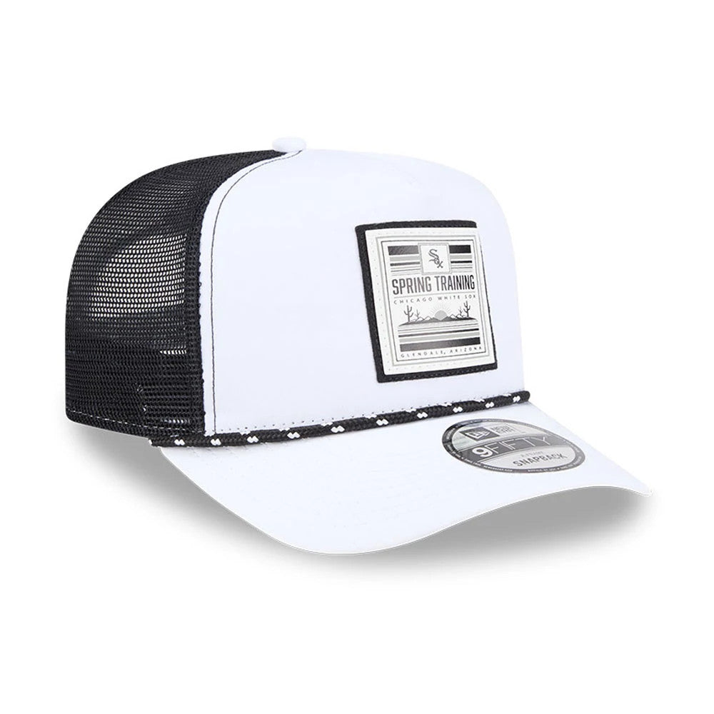 Chicago White Sox MLB Lines Black New Era 9FIFTY A-Frame Snapback Adjustable Cap, front three-quarter view showing the embroidered Spring Training graphic on the white front panel, curved white visor, and the black mesh side and back panels.