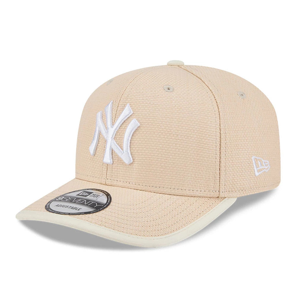 New York Yankees MLB Wicker Cream New Era 9SEVENTY Stretch Snap Adjustable Cap, front view showing the white raised embroidered NY logo on the cream front panel, a curved visor with a 9SEVENTY size sticker, and the New Era flag logo on the left side.