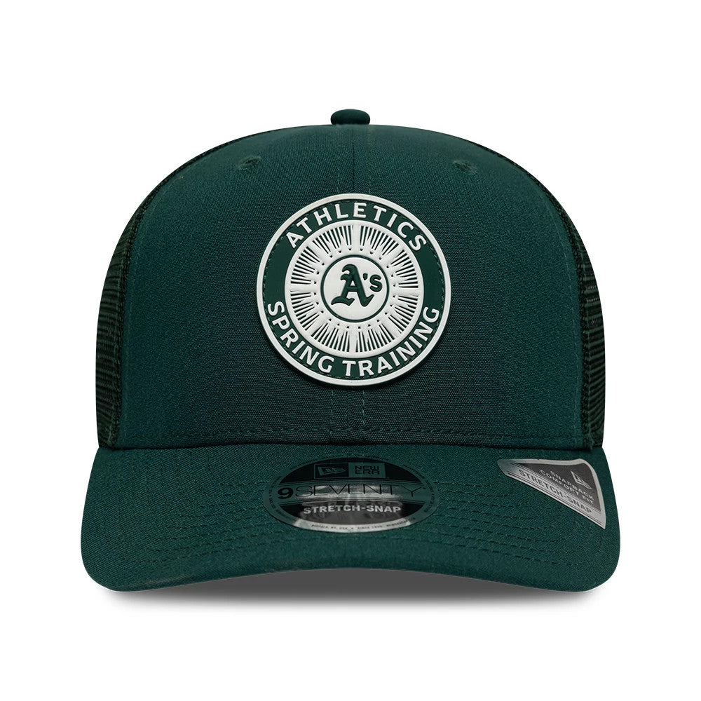 Athletics MLB Circles Dark Green New Era 9SEVENTY Stretch Snap Adjustable Cap, front view showing an embroidered Athletics Spring Training circle logo on the front panel, with a matching dark green curved visor and a 9SEVENTY size sticker.