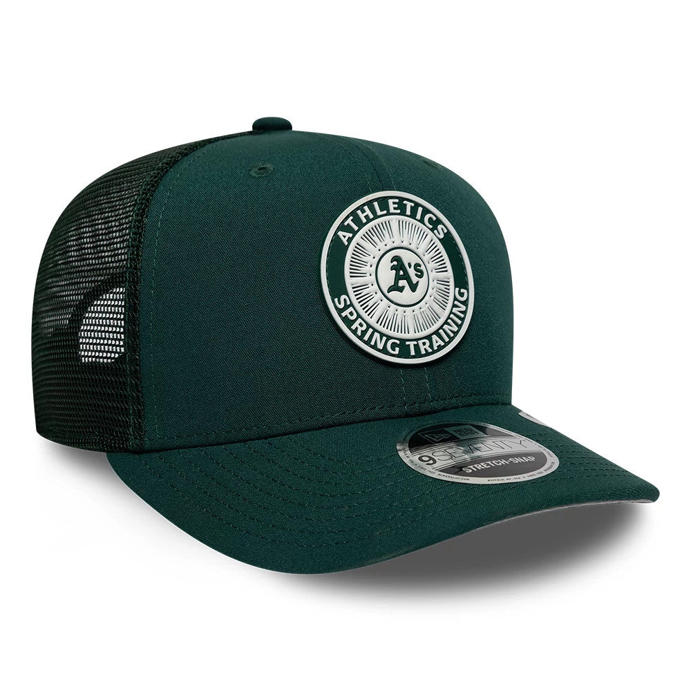 Athletics MLB Circles Dark Green New Era 9SEVENTY Stretch Snap Adjustable Cap, three-quarter view showing the raised embroidered white and green Athletics Spring Training logo on the front panel, dark green visor, and 9SEVENTY size sticker.
