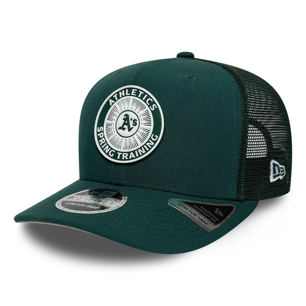 Athletics MLB Circles Dark Green New Era 9SEVENTY Stretch Snap Adjustable Cap, front view showing the white and dark green Athletics Spring Training circle logo embroidered on the front panel, with two stickers on the curved visor and a mesh rear.