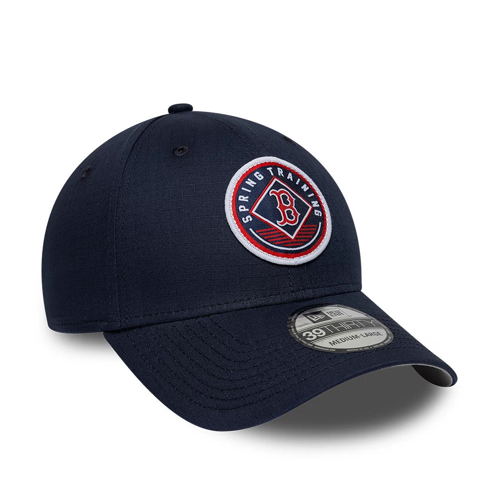 Boston Red Sox MLB Ripstop Navy New Era 39THIRTY Stretch Fit Cap, three-quarter view showing a raised embroidered Spring Training logo on the front panel, with a curved navy visor and a 39THIRTY size sticker on the visor.