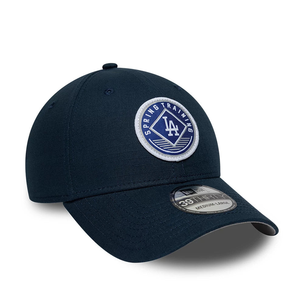 LA Dodgers MLB Ripstop Dark Blue New Era 39THIRTY Stretch Fit Cap, three-quarter view showing the embroidered Spring Training patch on the front panel, with a curved visor and 39THIRTY size sticker on top.