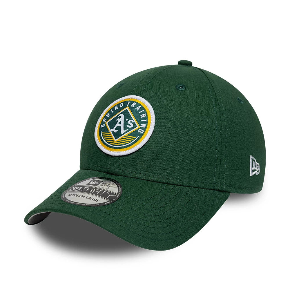 Athletics MLB Ripstop Dark Green New Era 39THIRTY Stretch Fit Cap, three-quarter view showing the embroidered Spring Training logo on the front panel, dark green curved visor with black undervisor, and a grey 39THIRTY size sticker on the visor.