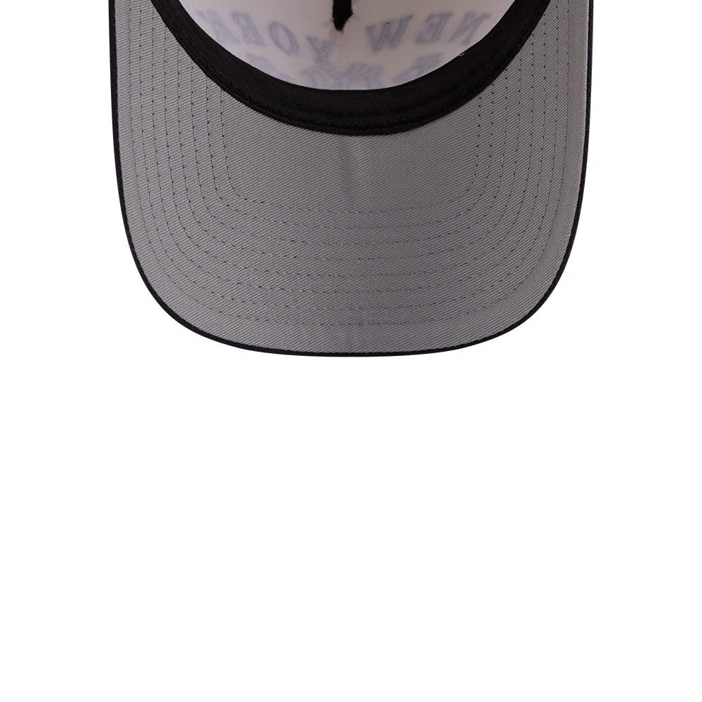 New York Yankees MLB Rope Cream New Era 9FORTY A-Frame Adjustable Cap, inside view showing the black sweatband, grey undervisor, and black taping with a light imprint of the New York Yankees logo on the fabric.
