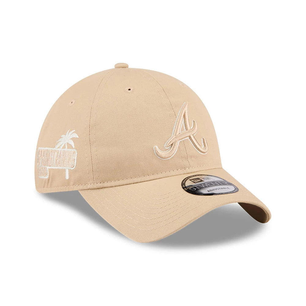 Atlanta Braves MLB Colours Light Beige New Era 9TWENTY Adjustable Cap, three-quarter view showing the raised white embroidered A logo on the front panel, with a palm tree design on the side and a 9TWENTY size sticker on the visor.