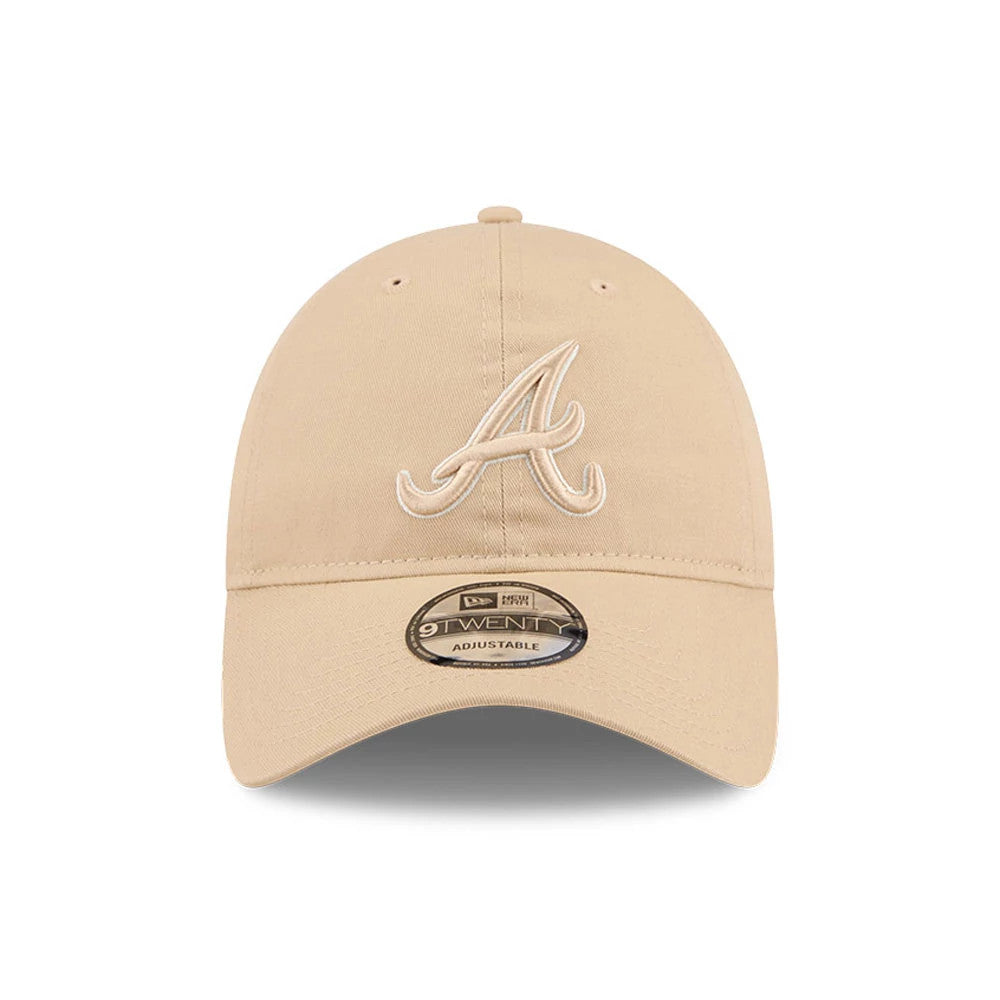 Atlanta Braves MLB Colours Light Beige New Era 9TWENTY Adjustable Cap, front view showing a raised beige embroidered A logo on the unstructured crown with a curved visor and a 9TWENTY size sticker on the centre.