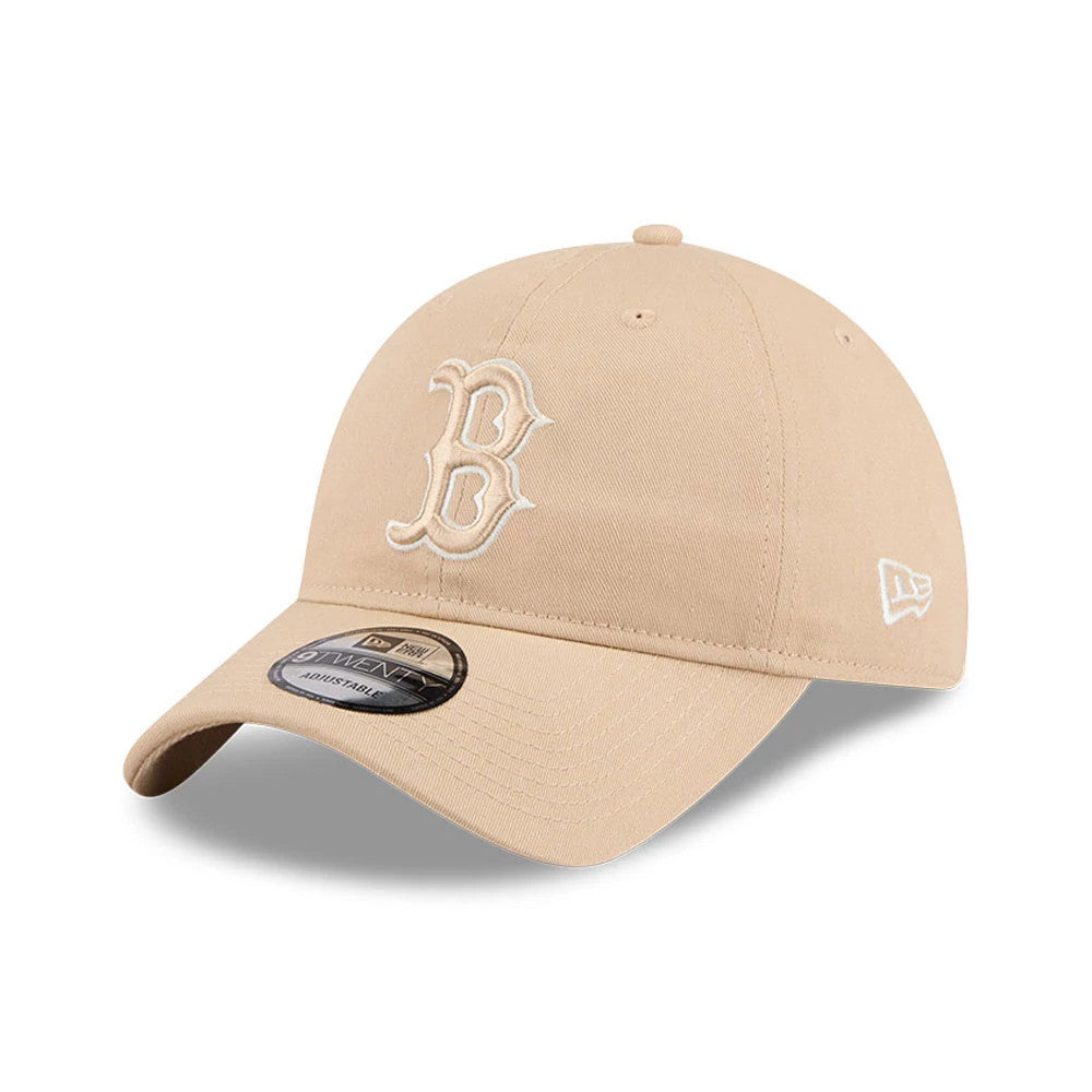 Boston Red Sox MLB Colours Light Beige New Era 9TWENTY Adjustable Cap, front view showing the raised white embroidered B logo on the centre of the unstructured light beige crown, with a curved visor and 9TWENTY size sticker.