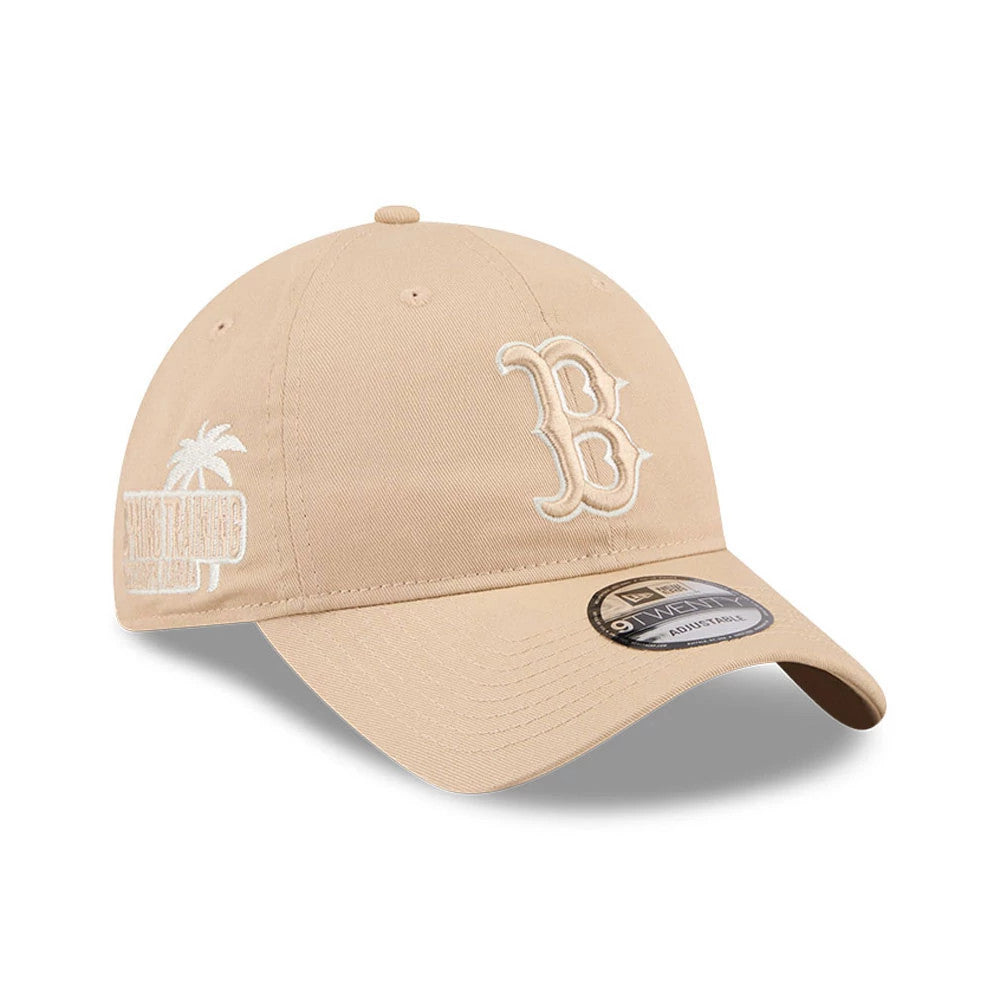 Boston Red Sox MLB Colours Light Beige New Era 9TWENTY Adjustable Cap, three-quarter view showing the raised white embroidered B logo on the front panel, curved visor with a 9TWENTY size sticker, and side palm tree logo embroidery.