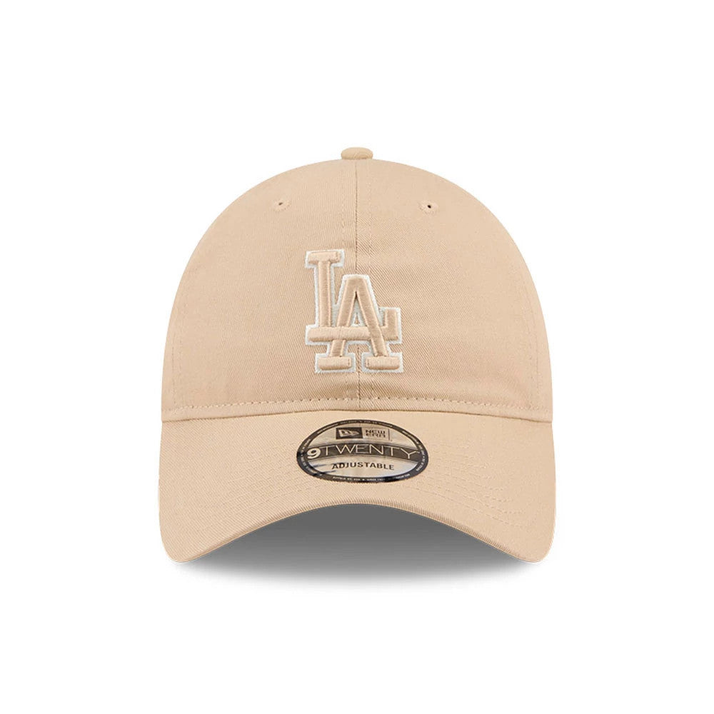 LA Dodgers MLB Colours Light Beige New Era 9TWENTY Adjustable Cap, front view with a white raised embroidered LA logo on the beige crown and a 9TWENTY size sticker on the curved visor.
