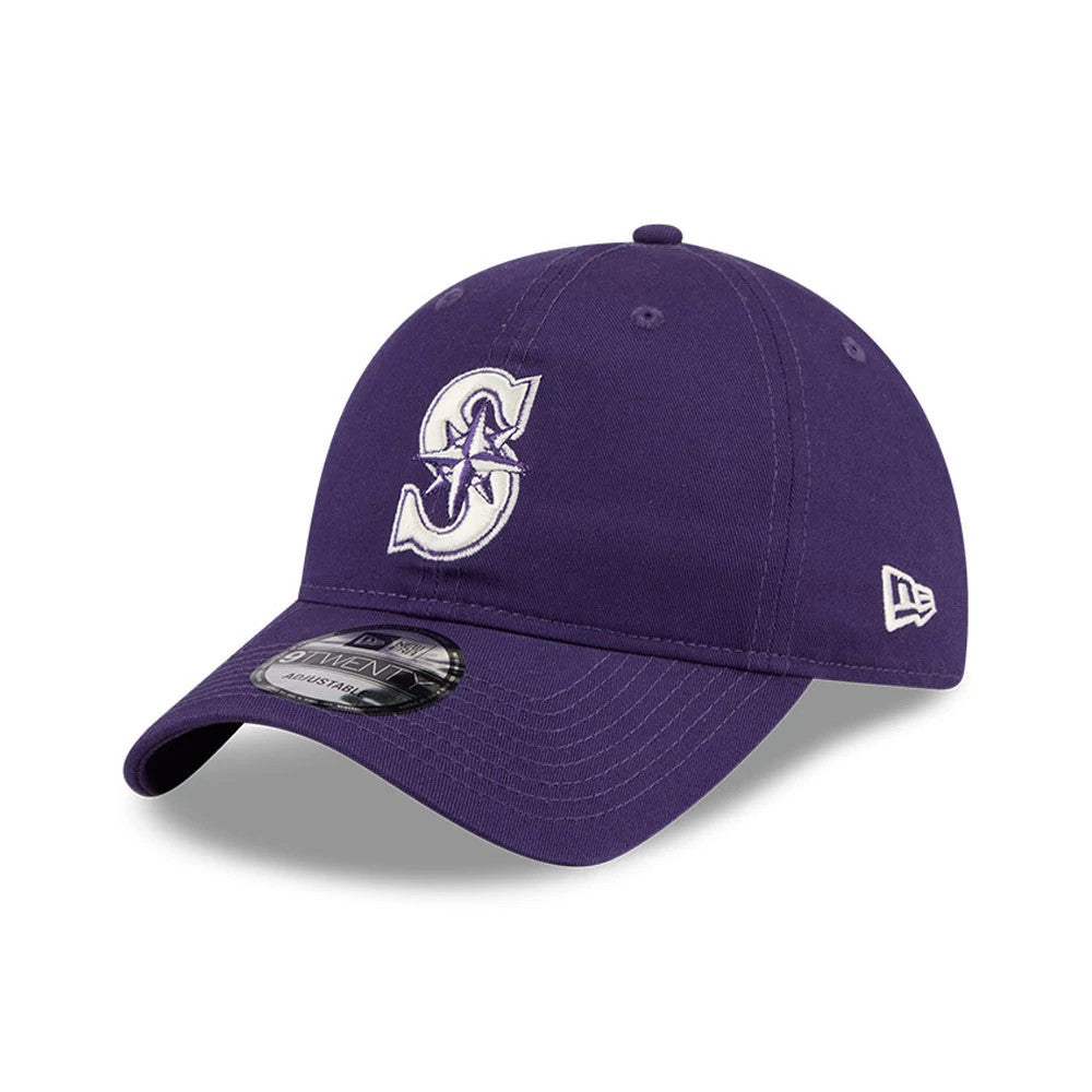 Seattle Mariners MLB Colours Purple New Era 9TWENTY Adjustable Cap, three-quarter view showing a white raised embroidered S logo with a star on the front panel, matching purple curved visor, and a 9TWENTY size sticker.