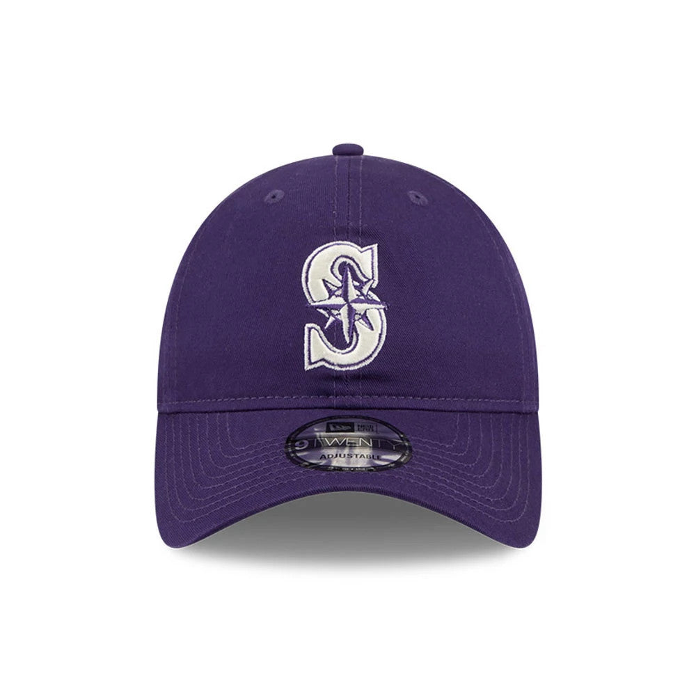 Seattle Mariners MLB Colours Purple New Era 9TWENTY Adjustable Cap, front view showing the white embroidered Mariners logo on the structured purple crown, with a curved visor and a 9TWENTY size sticker on the centre.