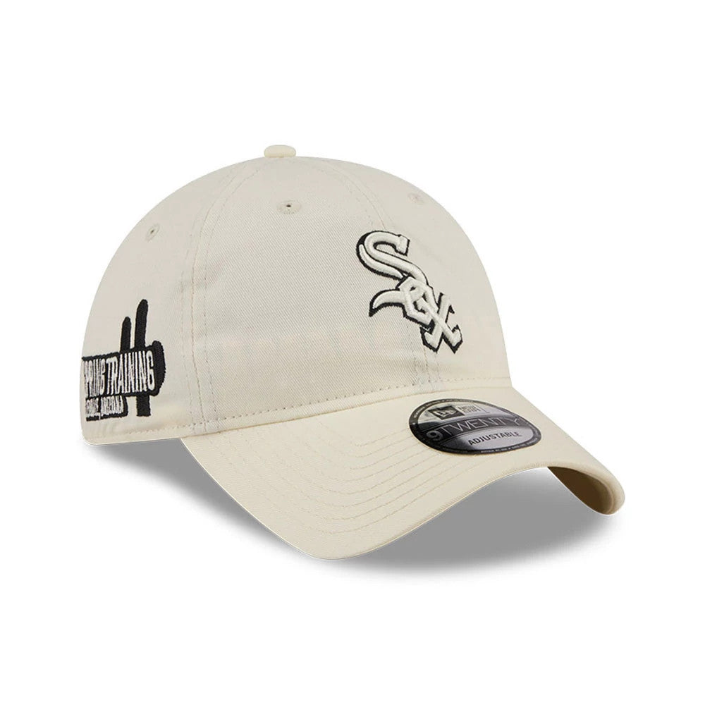 Chicago White Sox MLB Colours White New Era 9TWENTY Adjustable Cap, three-quarter view showing the raised embroidered Sox logo on the front panel, black Spring Training patch on the left side, and 9TWENTY size sticker on the curved visor.