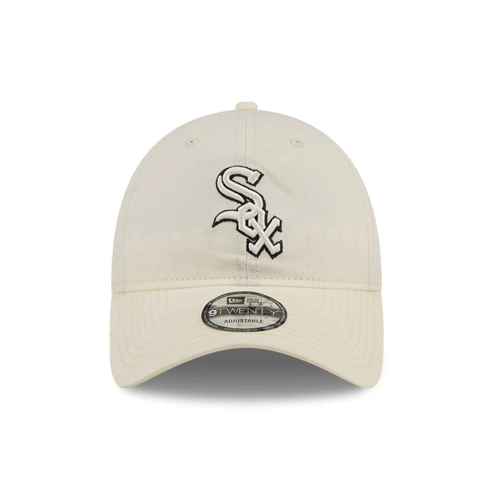 Chicago White Sox MLB Colours White New Era 9TWENTY Adjustable Cap, front view showing the black and white embroidered White Sox logo on the centre of the unstructured crown, with a curved visor and a 9TWENTY size sticker.