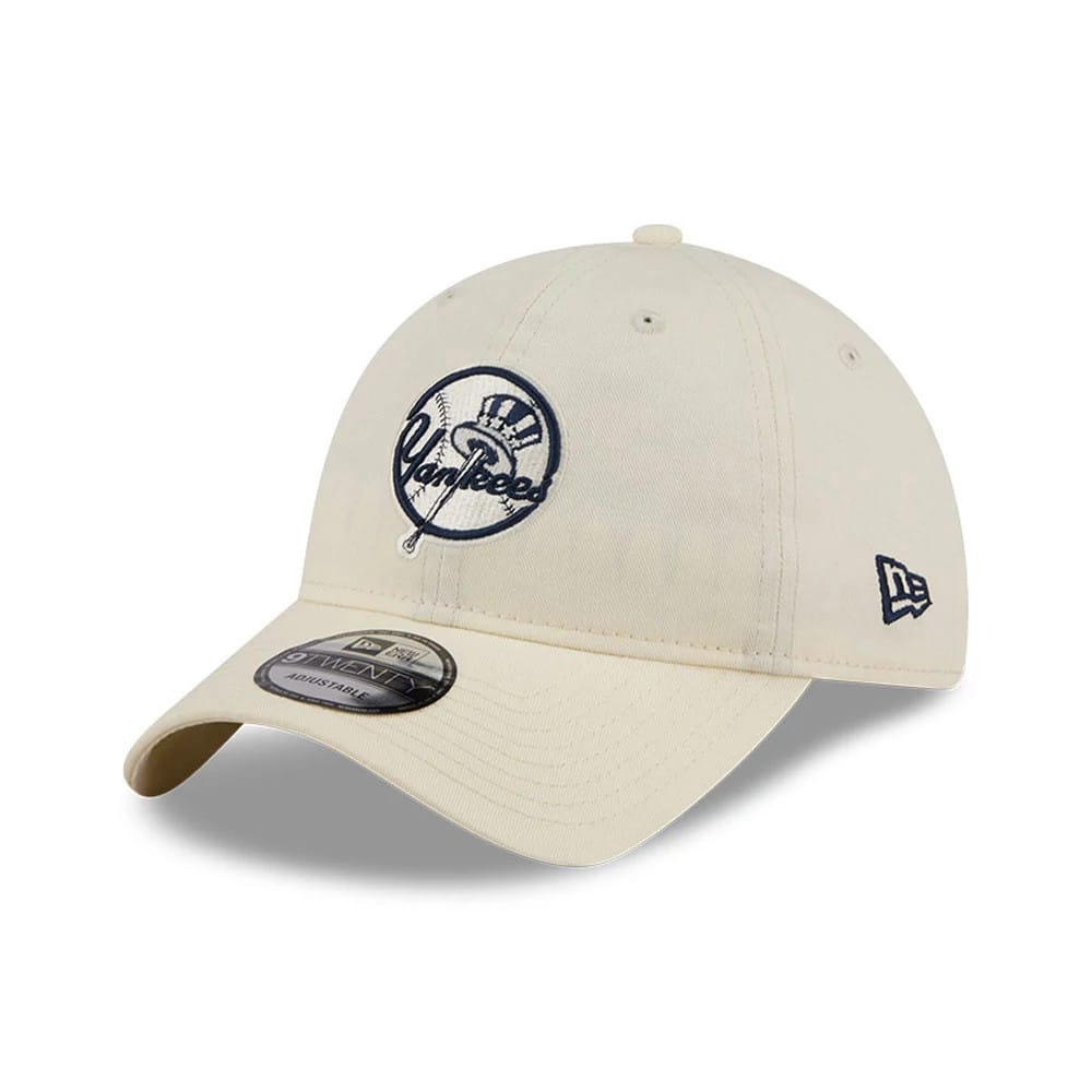 New York Yankees MLB Colours White New Era 9TWENTY Adjustable Cap, three-quarter view showing the navy embroidered Yankees logo on the front panel, curved white visor, and New Era flag logo on the left side.