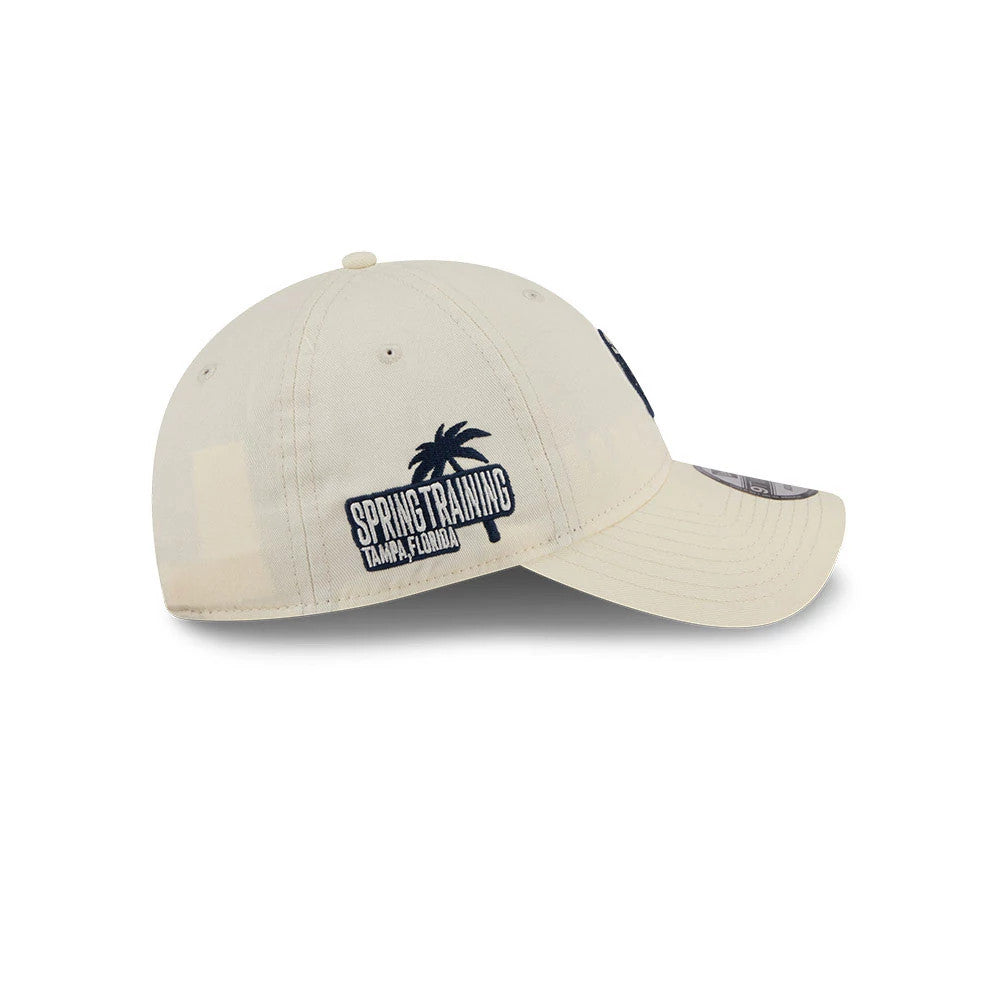 New York Yankees MLB Colours White New Era 9TWENTY Adjustable Cap, side view showing navy Spring Training Tampa, Florida embroidery with a palm tree on the structured white crown and a curved visor.