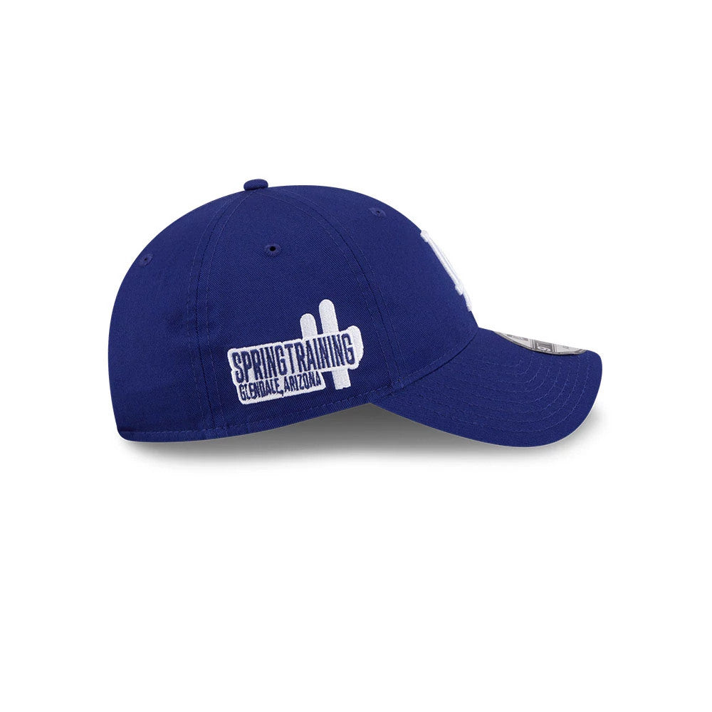 LA Dodgers MLB Colours Dark Blue New Era 9TWENTY Adjustable Cap, side view showing the white embroidered spring training logo with a cactus graphic on the left side, and a slightly curved visor.